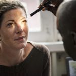 A Caucasian woman getting an eye examination