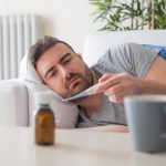 man_taking_his_temperature