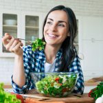 woman eating a salad